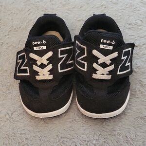 New Balance Toddler Black and White Sneakers
